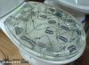 95632-clear_plastic_toilet_seat_razor_blades_inside.jpg