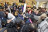 23910AEA00000578-2852835-Shoppers_scramble_to_pick_up_one-8_1417169462181.jpg