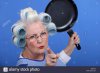 angry-old-woman-with-a-frying-pan-X957GG.jpg